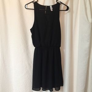 Black sleeveless shift dress